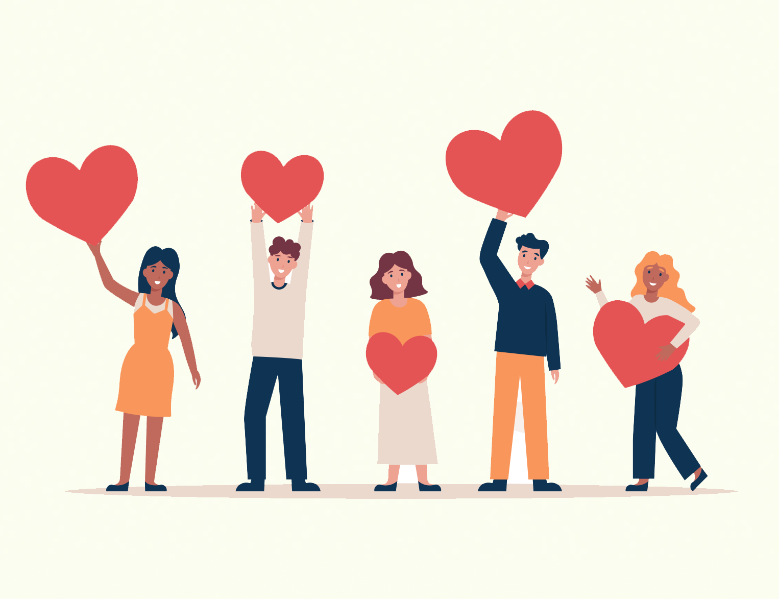 Diverse employees holding up hearts to signify thankfulness